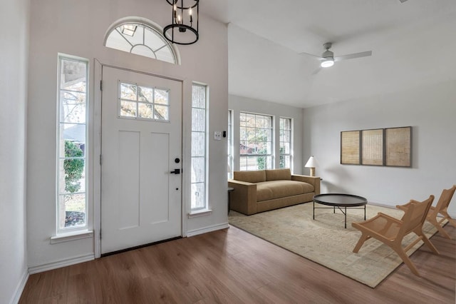 entryway with wood-type flooring, ceiling fan, and a healthy amount of sunlight