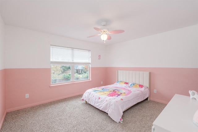 bedroom with ceiling fan and carpet floors