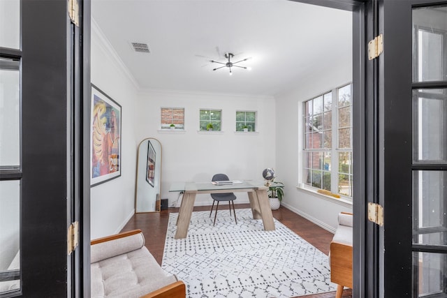 office space with a notable chandelier, ornamental molding, and dark hardwood / wood-style floors