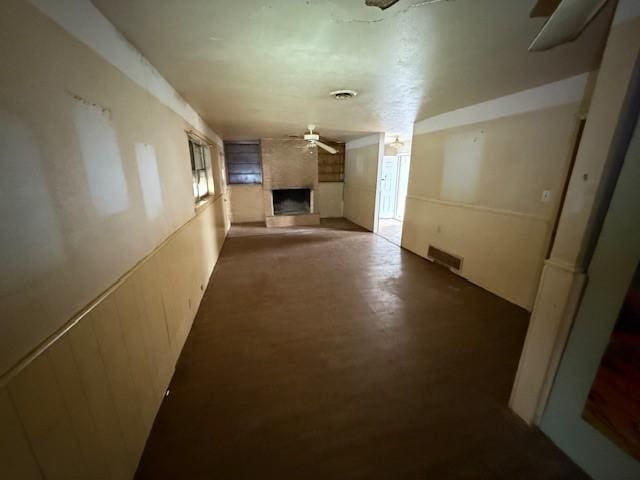 basement featuring a large fireplace