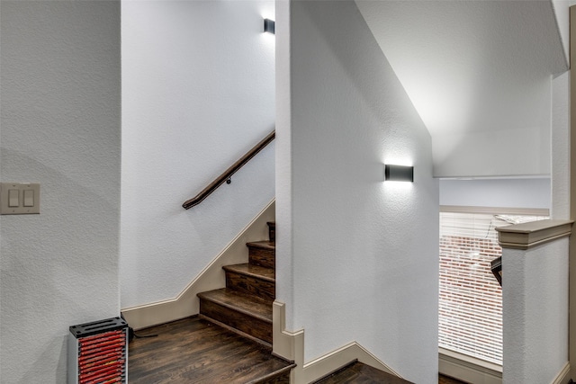 staircase featuring hardwood / wood-style flooring