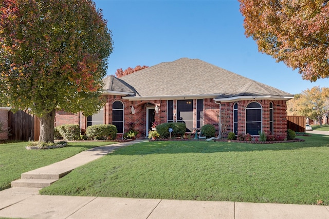 view of front of property with a front lawn