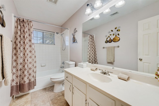 full bathroom featuring tile patterned flooring, shower / bath combination with curtain, a textured ceiling, toilet, and vanity