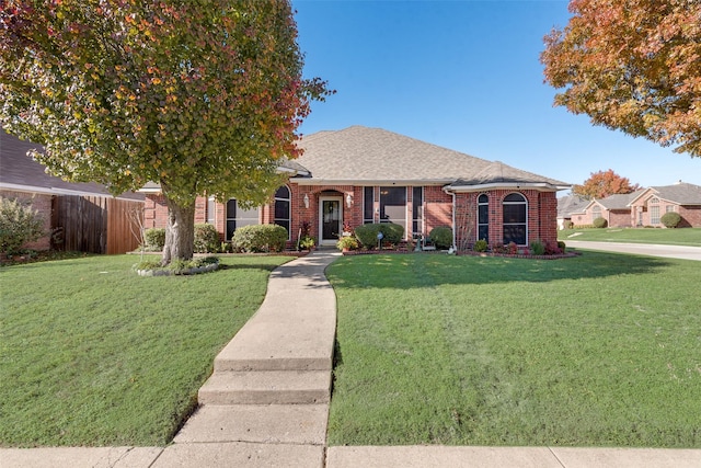 view of front of home with a front yard