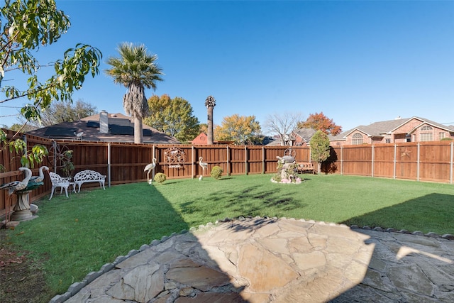 view of yard with a patio area