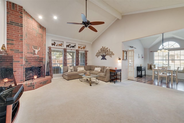 living room featuring ceiling fan, a brick fireplace, beamed ceiling, high vaulted ceiling, and hardwood / wood-style flooring