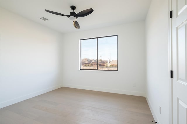 unfurnished room featuring light hardwood / wood-style flooring and ceiling fan