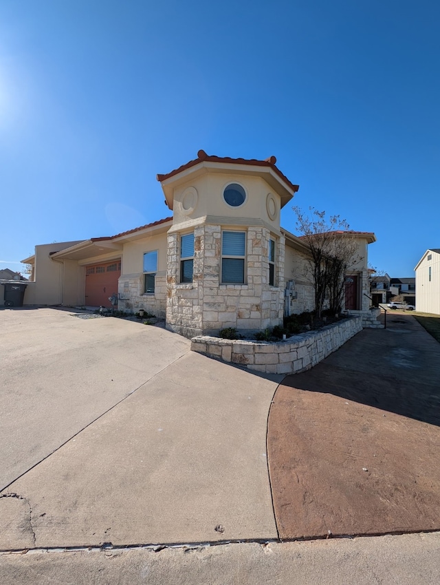 view of front of home with a garage