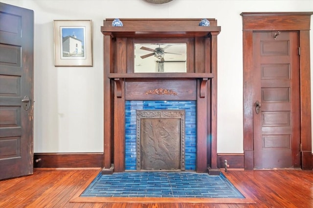 details with wood-type flooring