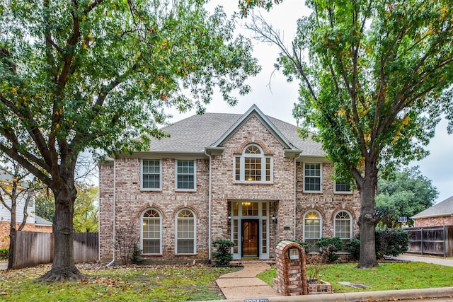 view of front of home with a front yard