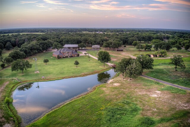 4676 County Road 2230, Caddo Mills, TX 75135 - view of subject property featuring a nearby body of water and a heavily wooded area