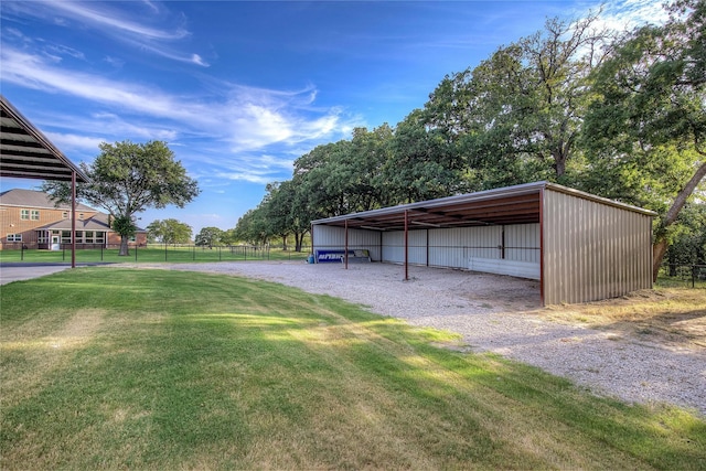 4676 County Road 2230, Caddo Mills, TX 75135 - view of pole building with gravel driveway and a detached carport