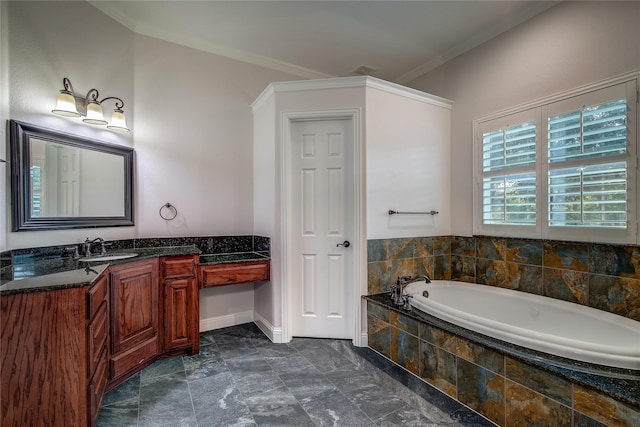 bathroom with ornamental molding, tiled bath, and vanity