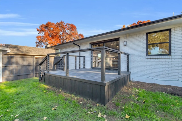 wooden deck with a yard