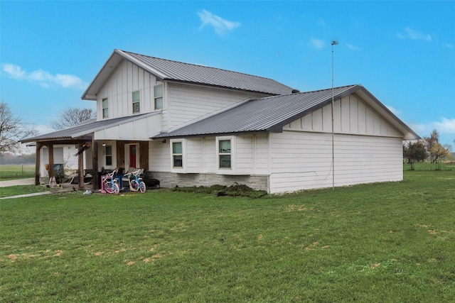 view of home's exterior with a lawn