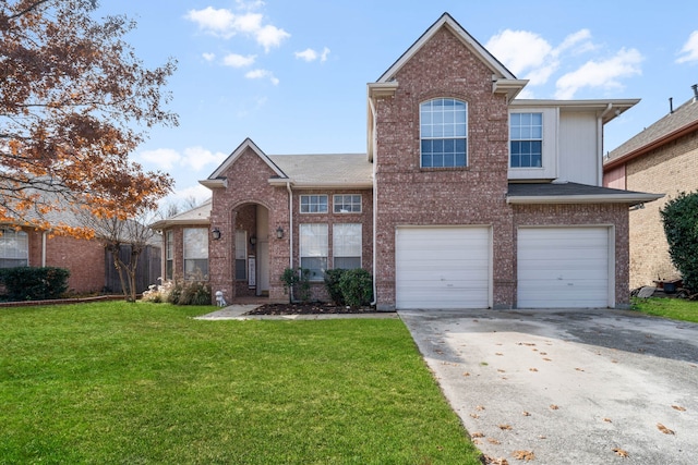 view of front property featuring a garage and a front lawn