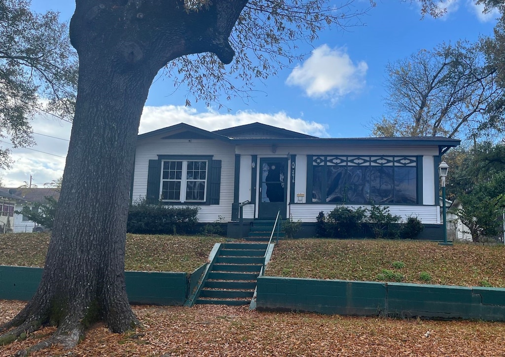 view of front of home with a front yard