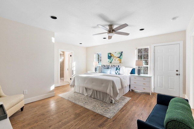 bedroom featuring light wood-type flooring and ceiling fan