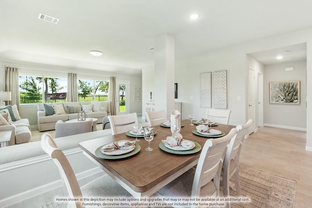 dining space with plenty of natural light