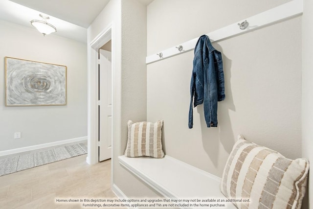 mudroom with light tile patterned floors