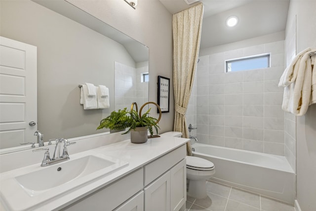 full bathroom featuring shower / tub combo, vanity, tile patterned floors, and toilet