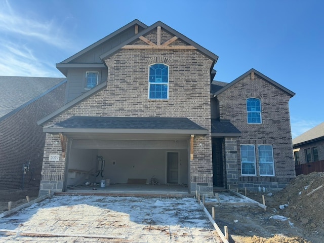 front facade with a garage