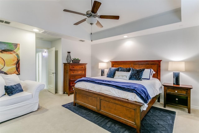 bedroom featuring ceiling fan and light colored carpet