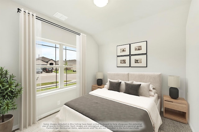 carpeted bedroom featuring vaulted ceiling