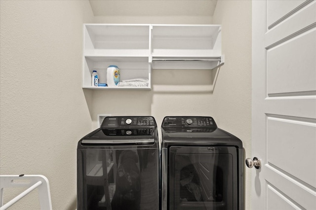 laundry room featuring washer and clothes dryer