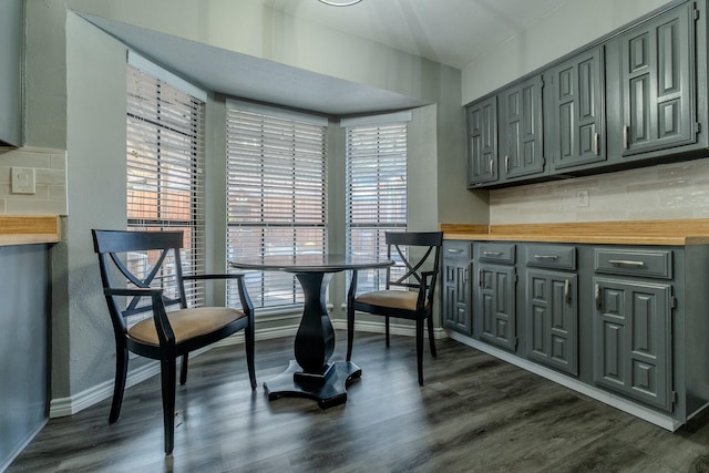 dining space featuring dark hardwood / wood-style floors