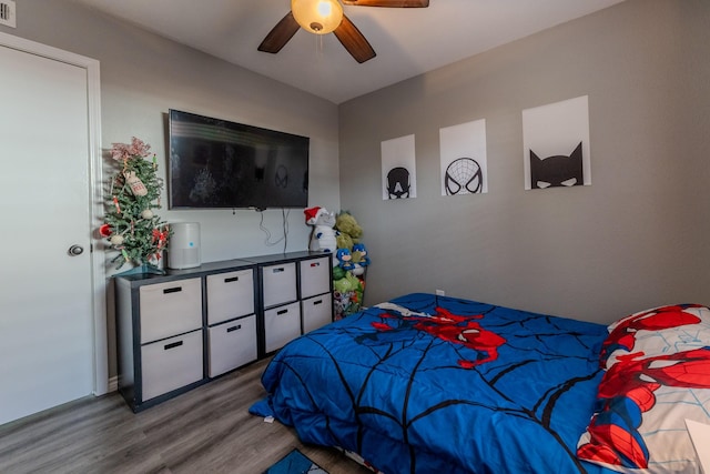 bedroom featuring ceiling fan and light hardwood / wood-style flooring