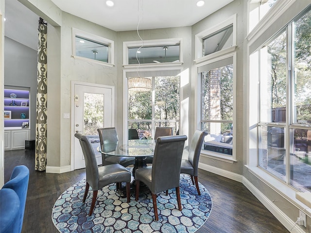 sunroom with a notable chandelier