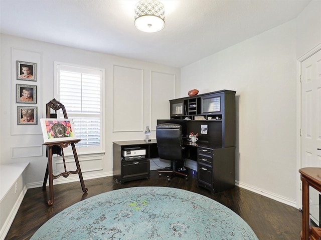 office space with dark hardwood / wood-style flooring