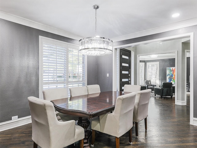 dining space with ornamental molding, dark wood-type flooring, and an inviting chandelier