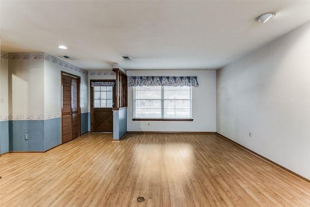 empty room with wood-type flooring