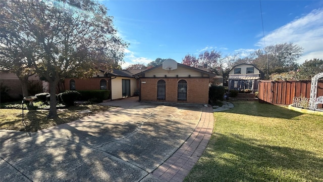 view of front of home with a front yard