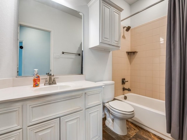 full bathroom with vanity, toilet, and shower / bath combo with shower curtain