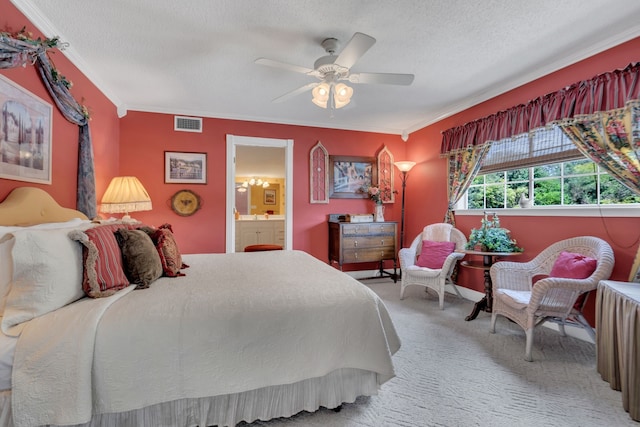 bedroom featuring ceiling fan, ornamental molding, carpet flooring, and a textured ceiling