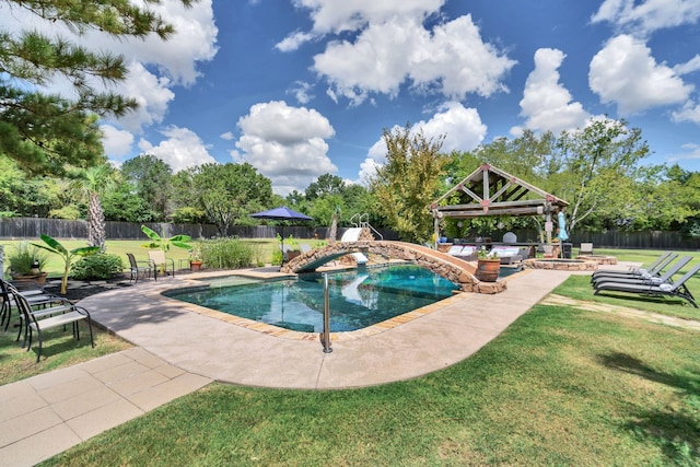 view of pool featuring a gazebo, a yard, a water slide, and a patio