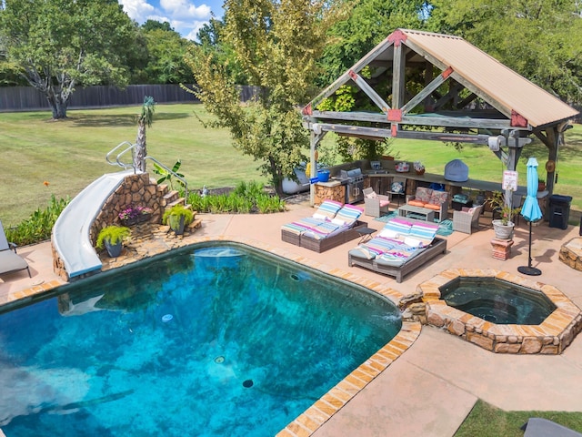 view of swimming pool with a patio, a lawn, an in ground hot tub, a water slide, and a gazebo