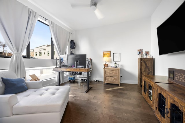 office space featuring ceiling fan and dark wood-type flooring