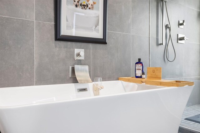 bathroom featuring a tub to relax in