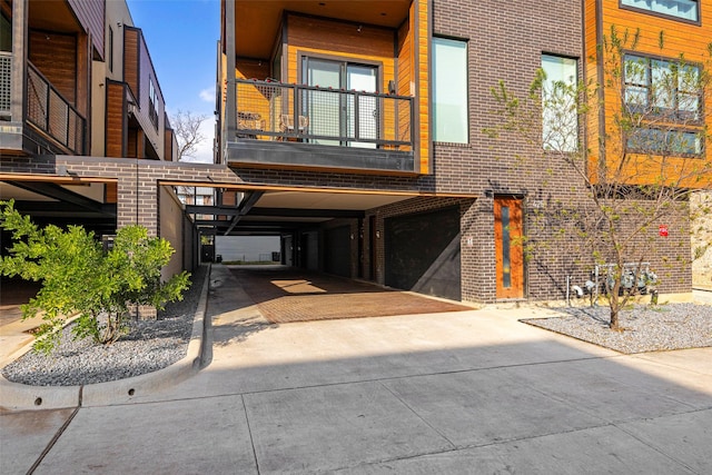 entrance to property with a balcony