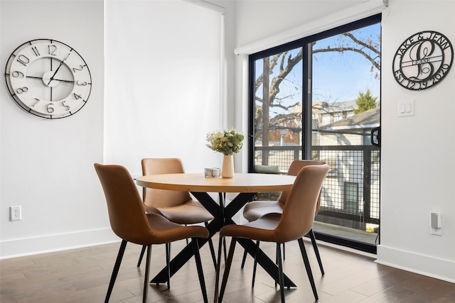 dining area featuring hardwood / wood-style flooring