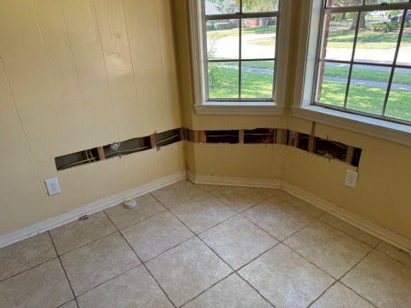 view of tiled spare room