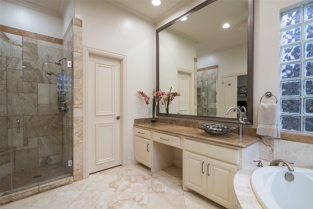 bathroom with vanity, separate shower and tub, and crown molding