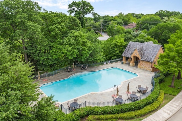 view of pool featuring a patio