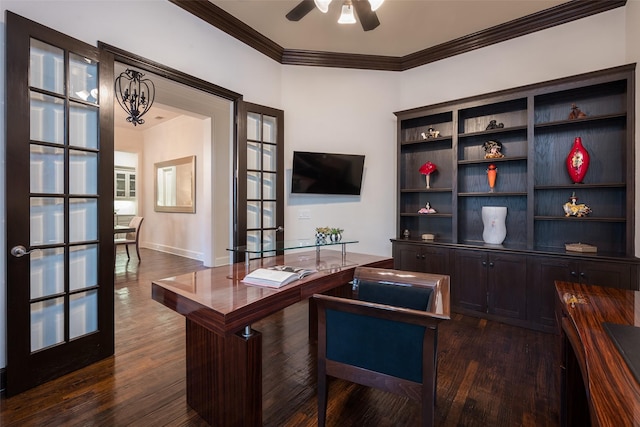 office space with dark hardwood / wood-style floors, ornamental molding, ceiling fan with notable chandelier, and french doors