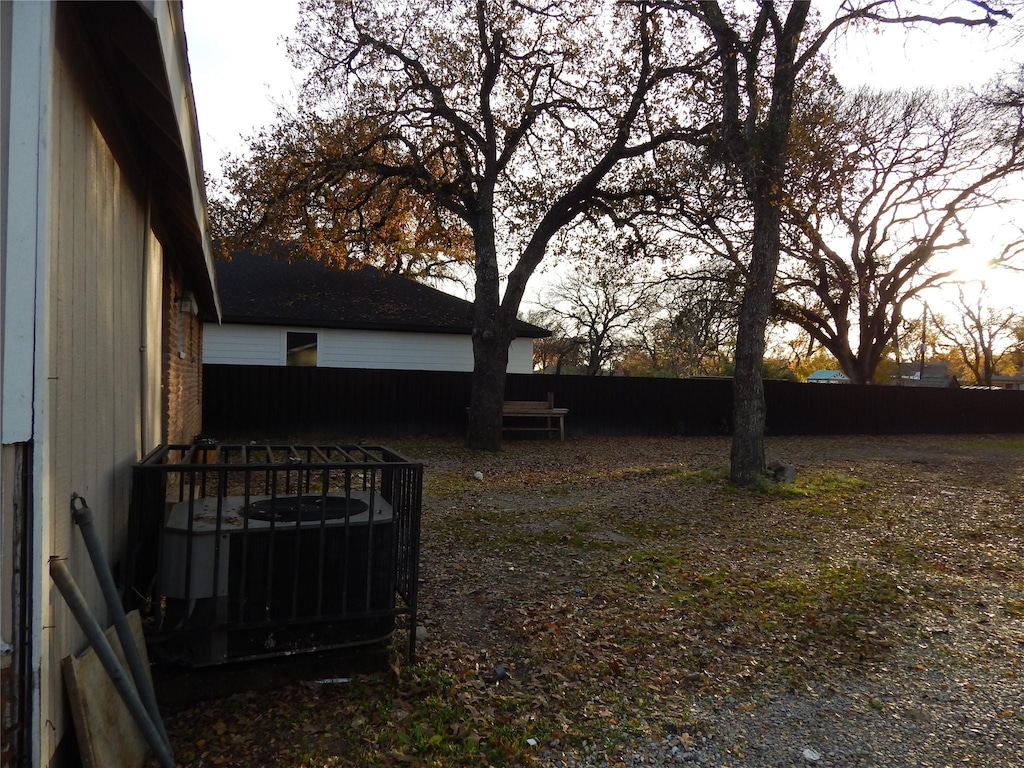 view of yard with central AC