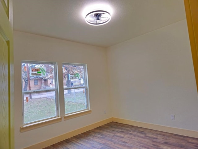 empty room featuring hardwood / wood-style flooring